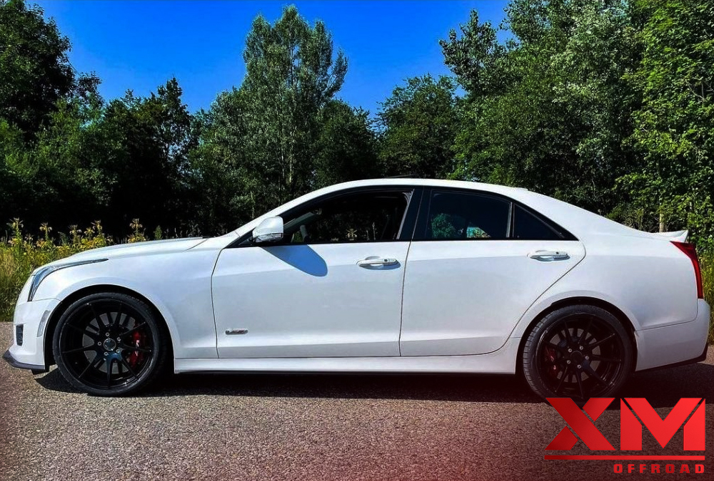 The Timeless Luxurious Look of a White Car with Black Rims